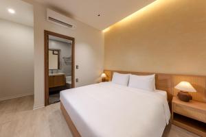 Ένα ή περισσότερα κρεβάτια σε δωμάτιο στο Green Bay Hotel Ninh Bình
