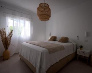 Posteľ alebo postele v izbe v ubytovaní Relax Pasito Blanco