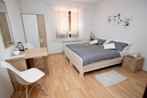Postel nebo postele na pokoji v ubytování Guesthouse Sanabor