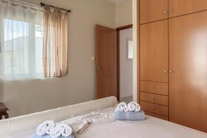 Posteľ alebo postele v izbe v ubytovaní Alisahni Home 2