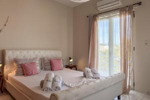 Posteľ alebo postele v izbe v ubytovaní Alisahni Home 2