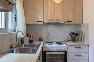 Kuchyňa alebo kuchynka v ubytovaní Alisahni Home 2