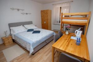 Postel nebo postele na pokoji v ubytování Guesthouse Sanabor