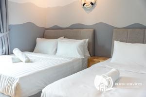Maya Bay Residences at Gamuda Cove, Dengkil by Plush客房内的一张或多张床位