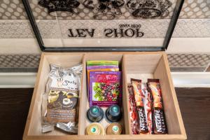 a box of new antidepressives and candy in a drawer at Stergios_Apartments 02 in Kozani
