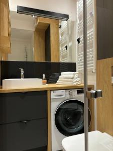 Koupelna v ubytování Słoneczny Apartament Poleska