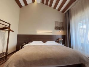 Lova arba lovos apgyvendinimo įstaigoje Luyu Shijian B&B