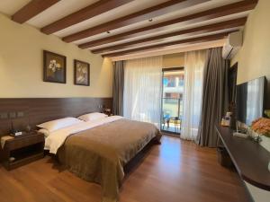 Lova arba lovos apgyvendinimo įstaigoje Luyu Shijian B&B