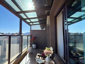 Balkonas arba terasa apgyvendinimo įstaigoje Luyu Shijian B&B