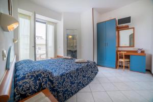 Postel nebo postele na pokoji v ubytování Hotel Golf