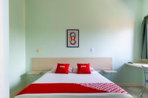Postel nebo postele na pokoji v ubytování OYO Hotel Cosmópolis, Sao Paulo
