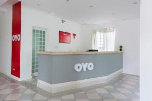 TV a/nebo společenská místnost v ubytování OYO Hotel Cosmópolis, Sao Paulo