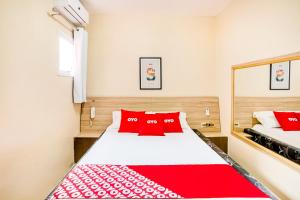 Postel nebo postele na pokoji v ubytování OYO Hotel Itarantim, São Paulo