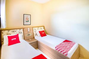 Postel nebo postele na pokoji v ubytování OYO Hotel Itarantim, São Paulo