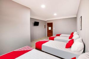 Postel nebo postele na pokoji v ubytování OYO Hotel Boneville, São Paulo