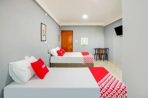 Postel nebo postele na pokoji v ubytování OYO Hotel Boneville, São Paulo