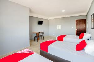 Postel nebo postele na pokoji v ubytování OYO Hotel Boneville, São Paulo