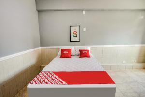 Postel nebo postele na pokoji v ubytování OYO Hotel Boneville, São Paulo