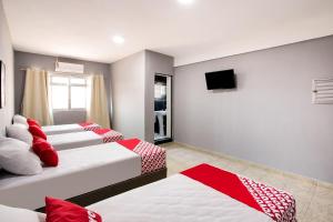 Postel nebo postele na pokoji v ubytování OYO Hotel Boneville, São Paulo
