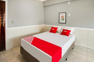 Postel nebo postele na pokoji v ubytování OYO Hotel Boneville, São Paulo