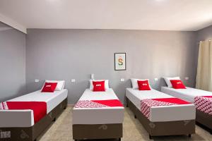Postel nebo postele na pokoji v ubytování OYO Hotel Boneville, São Paulo