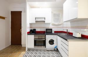 Kuchyň nebo kuchyňský kout v ubytování Stay U-nique Apartments Radas