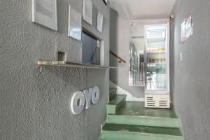 TV a/nebo společenská místnost v ubytování OYO Hotel Dom Pedro, São Paulo