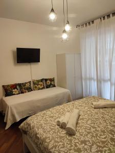 Postel nebo postele na pokoji v ubytování Leonardo Rome Holidays