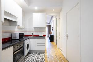 Kuchyň nebo kuchyňský kout v ubytování Stay U-nique Apartments Radas