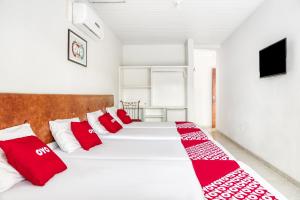 Postel nebo postele na pokoji v ubytování OYO Praia Hotel Recanto do Tomé - Salvador