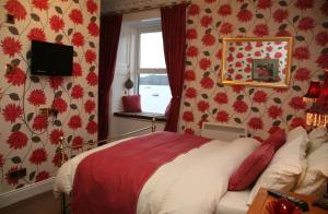 Llit o llits en una habitació de Mishnish Hotel