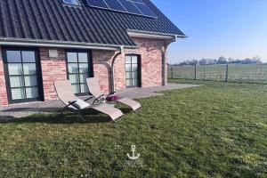 Φωτογραφία από το άλμπουμ του Luxuriöses Ferienhaus Route 66 mit Sauna und Whirlwanne σε Osterhever