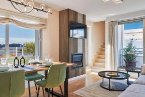 Et opholdsområde på Vitania I Resort Penthouse with Jacuzzi