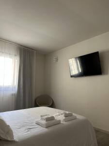 TV a/nebo společenská místnost v ubytování 7Suites + 36 fotografií