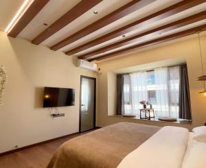 Lova arba lovos apgyvendinimo įstaigoje Luyu Shijian B&B