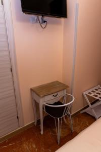 TV in/ali zabaviščno središče v nastanitvi Apulia Concept B&B