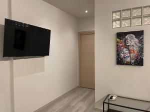TV a/nebo společenská místnost v ubytování 7Suites