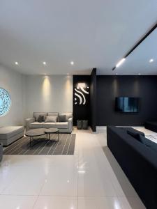 Et tv og/eller underholdning på Nossacasa Villa Sejuk Estetik Pool Setiabudi Bandung