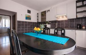 Kuchyň nebo kuchyňský kout v ubytování Apartments Tresan