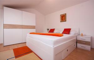 Postel nebo postele na pokoji v ubytování Apartments Tresan