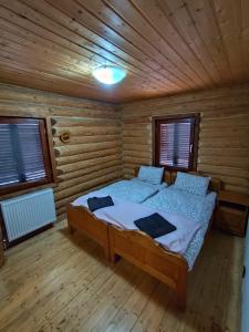 Ένα ή περισσότερα κρεβάτια σε δωμάτιο στο Veresko Villa