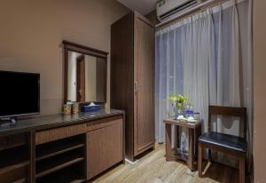 Μια τηλεόραση ή/και κέντρο ψυχαγωγίας στο Collection O Le Grand Hanoi hotel - The Tryst