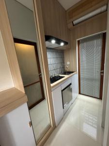 Kuchyň nebo kuchyňský kout v ubytování The Hita Uluwatu