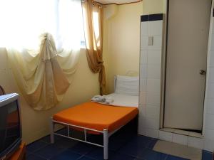 Postel nebo postele na pokoji v ubytování Marian Palazz Hotel
