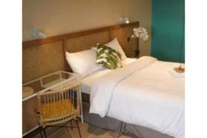 Postel nebo postele na pokoji v ubytování Marian Palazz Hotel