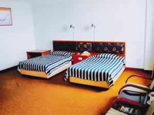 Postel nebo postele na pokoji v ubytování Hotel O Hotel Ramai