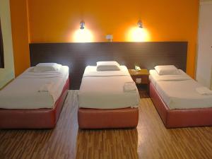 Postel nebo postele na pokoji v ubytování Hotel O Hotel Ramai