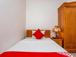 Postel nebo postele na pokoji v ubytování Hotel O Hotel Ramai