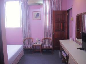 TV a/nebo společenská místnost v ubytování Hotel O Hotel Ramai