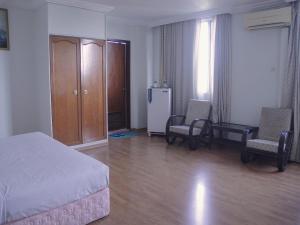 Postel nebo postele na pokoji v ubytování Hotel O Hotel Ramai